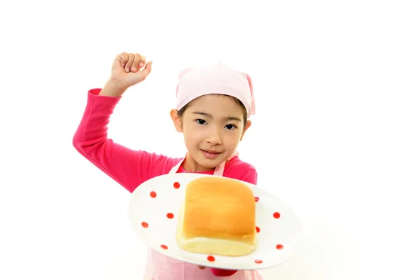 Dziewczyna trzyma chleb — Zdjęcie stockowe