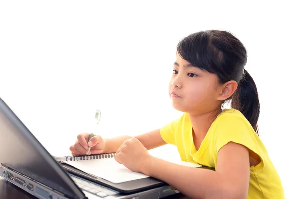 Girl using a laptop — Stock Photo, Image