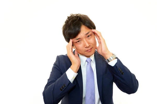 Biznesmen o ból głowy — Zdjęcie stockowe