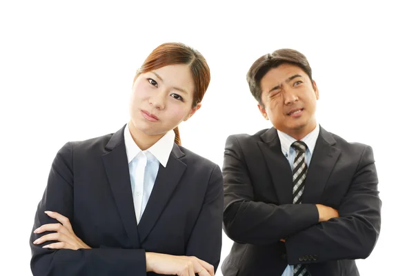 Dissatisfied businessman and businesswoman — Stock Photo, Image