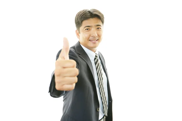 Счастливый бизнесмен показывает большой палец вверх — стоковое фото