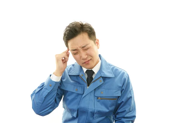 Worker having a headache — Stock Photo, Image