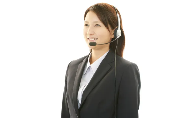 Operatore di call center sorridente — Foto Stock