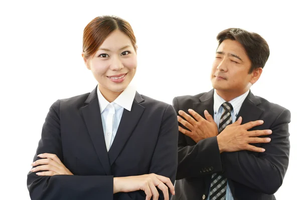 Smiling businessman and businesswoman — Stock Photo, Image