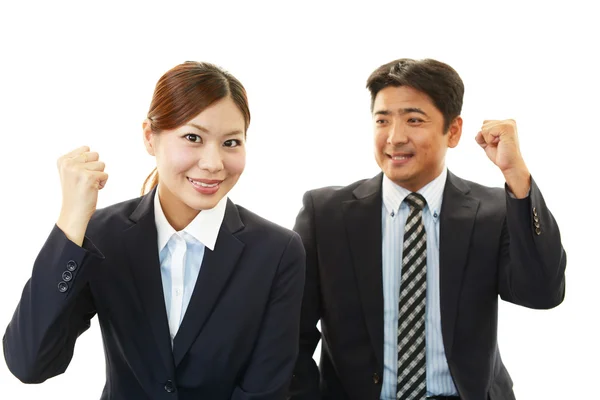 Smiling businessman and businesswoman — Stock Photo, Image