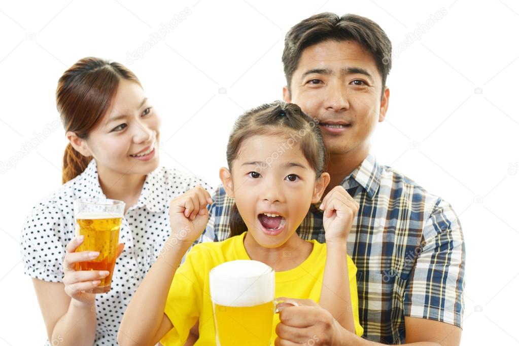 Smiling family with beverage