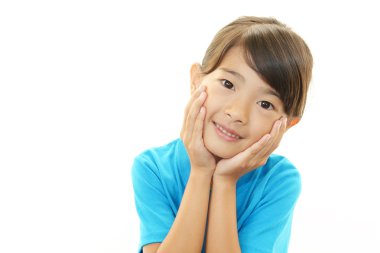 Asyalı kız mutlu bir gülümseme