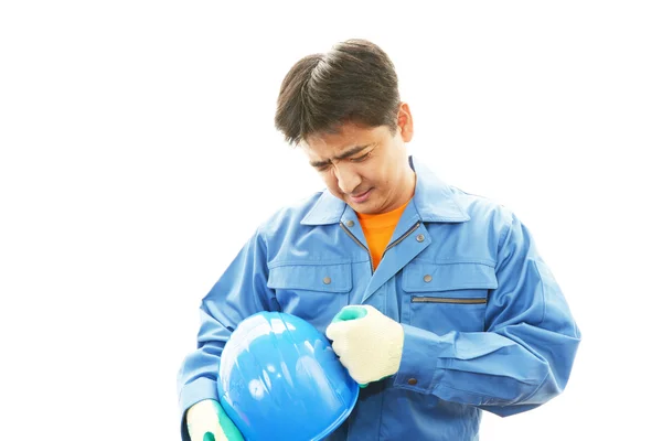 Tired and stressed Asian worker — Stock Photo, Image