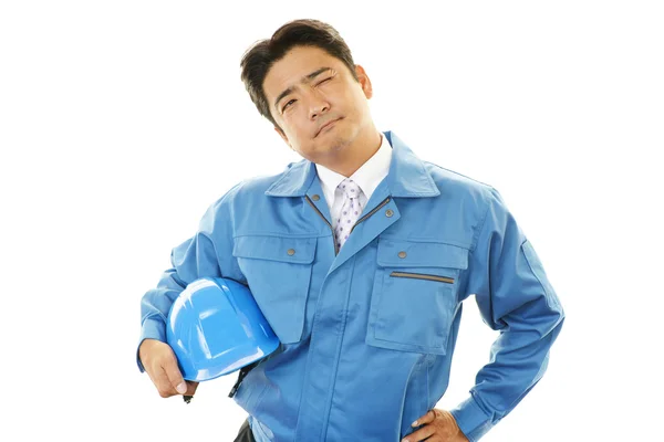 Tired and stressed Asian worker — Stock Photo, Image