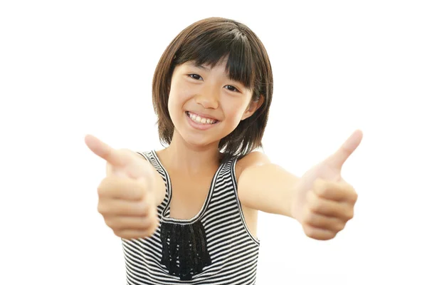 Šťastná dívka ukazuje palec nahoru znamení — Stock fotografie