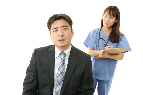 Médecin et patient à l'examen — Photo