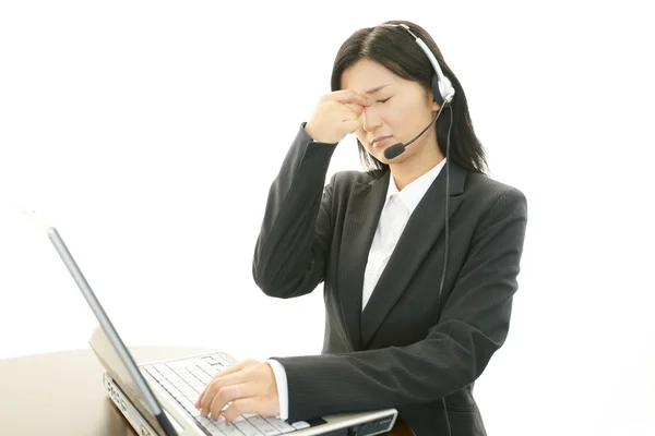 Tired call center operator — Stock Photo, Image
