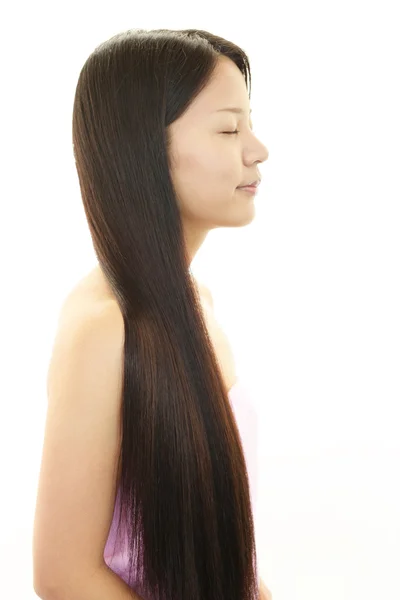 Young woman with beautiful hair — Stock Photo, Image