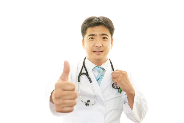 Doctor showing thumbs up sign — Stock Photo, Image