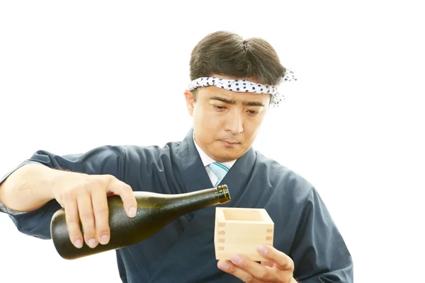 Working Asian waiter — Stock Photo, Image