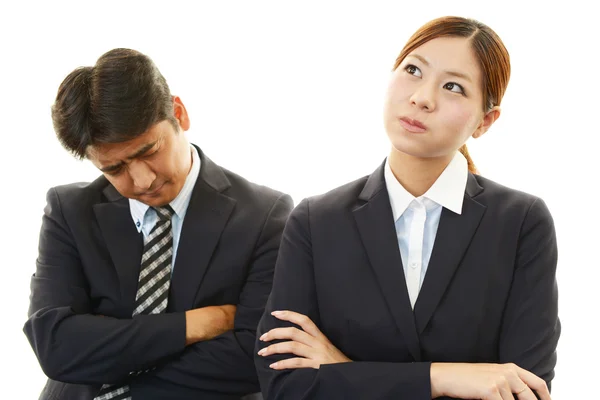 Dissatisfied businessman and businesswoman — Stock Photo, Image