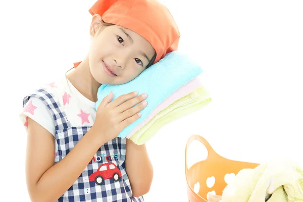 Child with laundry basket — Stock Photo, Image