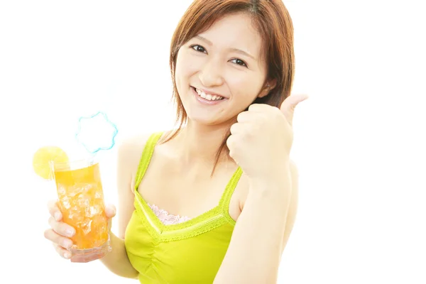 Woman drinking juice — Stock Photo, Image