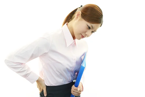 Mulher de negócios com dor nas costas . — Fotografia de Stock