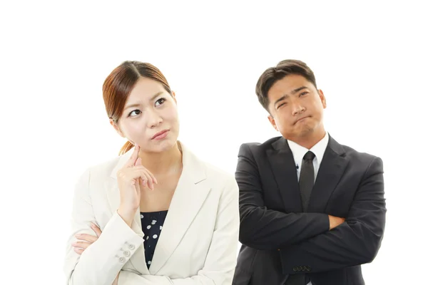 Dissatisfied businessman and businesswoman — Stock Photo, Image
