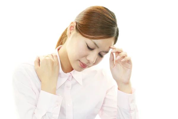 Cansado y estresado joven mujer asiática — Foto de Stock