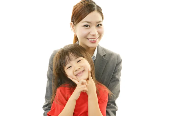 Smiling child with mother — Stock Photo, Image