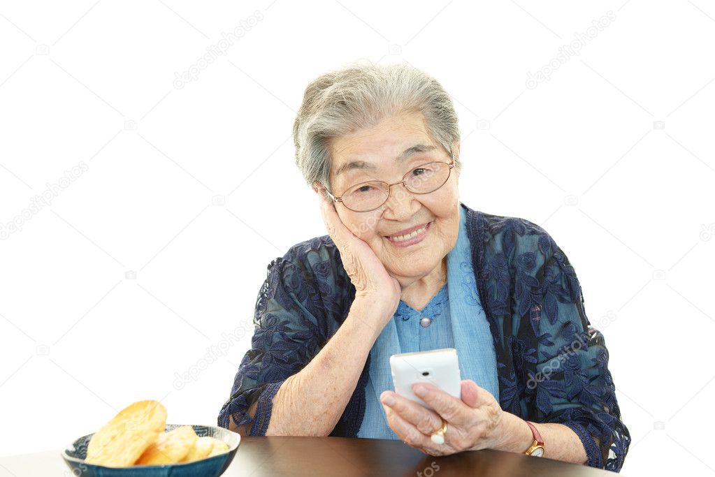 Old woman with mobile phone