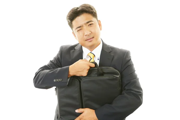 Tired Asian businessman — Stock Photo, Image