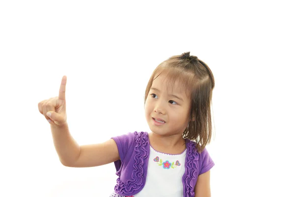 Niña feliz señalando —  Fotos de Stock