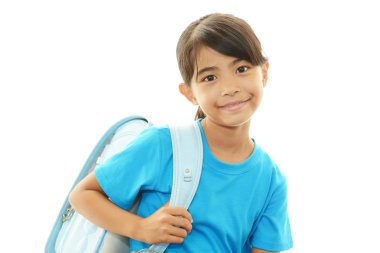 Asyalı kız gülümseyerek