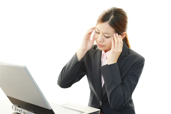 Businesswoman having a headache — Stock Photo, Image