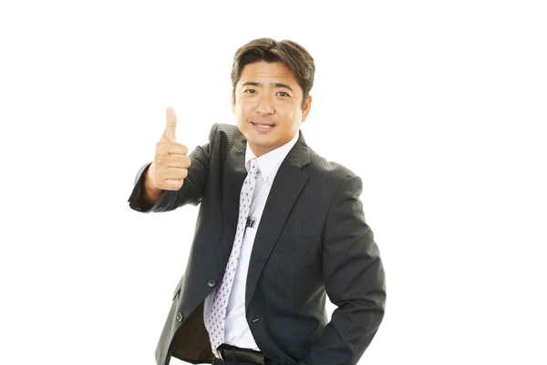 Człowiek szczęśliwy biznesu Wyświetlono kciuki znak — Zdjęcie stockowe