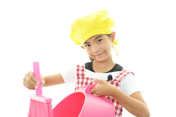 Flicka med en rengöring — Stockfoto