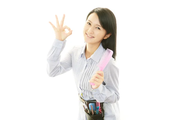 Smiling Asian hairdresser — Stock Photo, Image