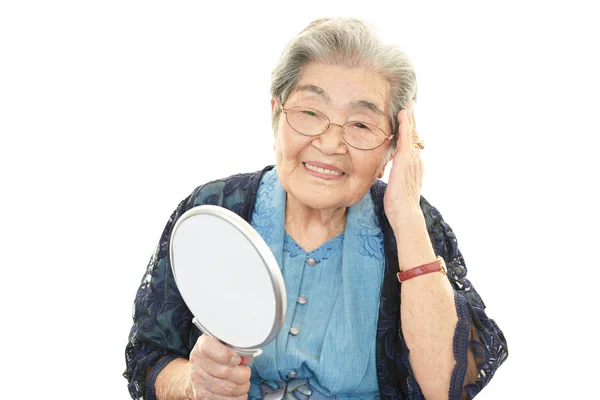 Smiling old woman — Stock Photo, Image