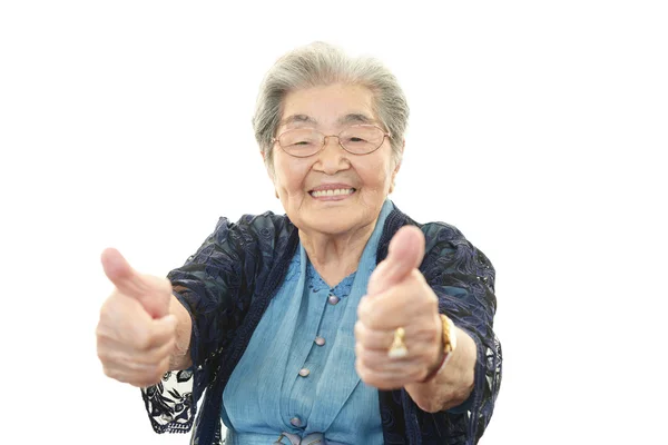 Gülümseyen yaşlı kadın — Stok fotoğraf