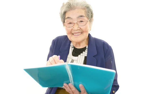 Smiling old woman — Stock Photo, Image