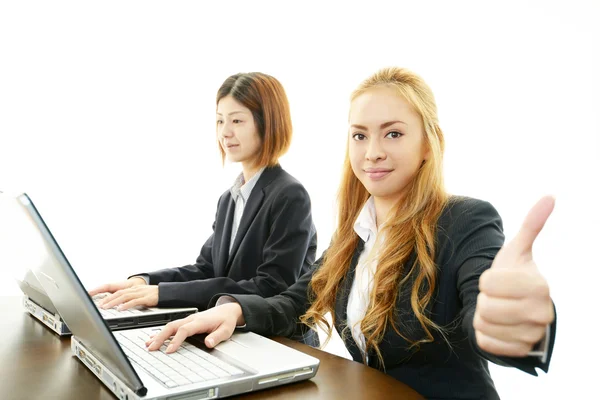 Smiling call center operators — Stock Photo, Image