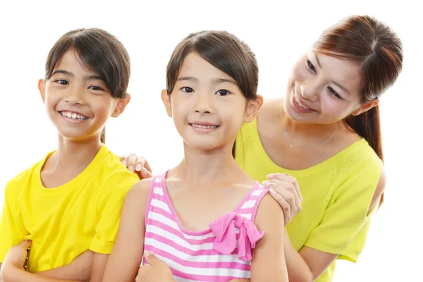 Smiling children with mother — Stock Photo, Image