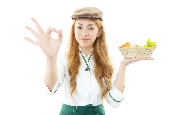 Waitress delivering meal to table — Stock Photo, Image