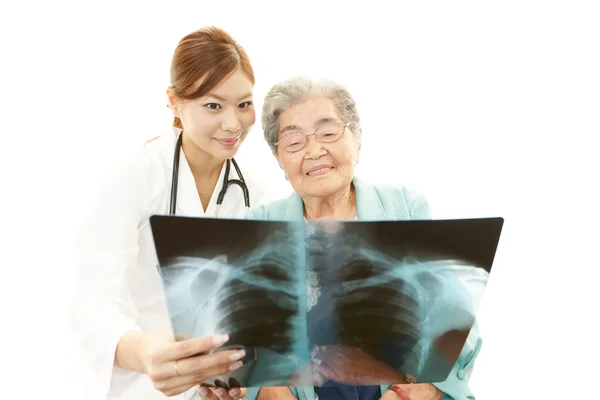 Asian medical doctor and senior woman — Stock Photo, Image