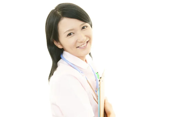 Smiling Asian female nurse — Stock Photo, Image