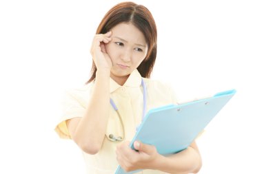 Depresyonda Asyalı kadın hemşire