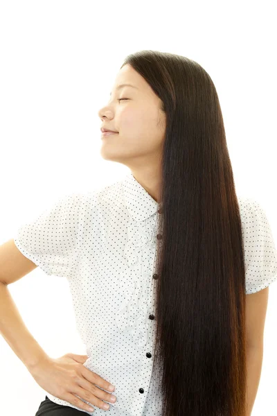 Mujer joven con cabello hermoso — Foto de Stock