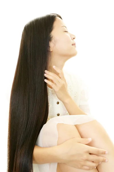 Woman taking care of her hair — Stock Photo, Image