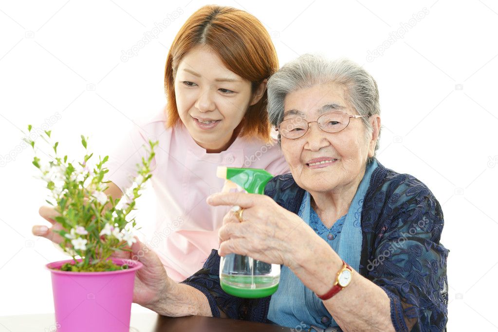 Old woman with plant