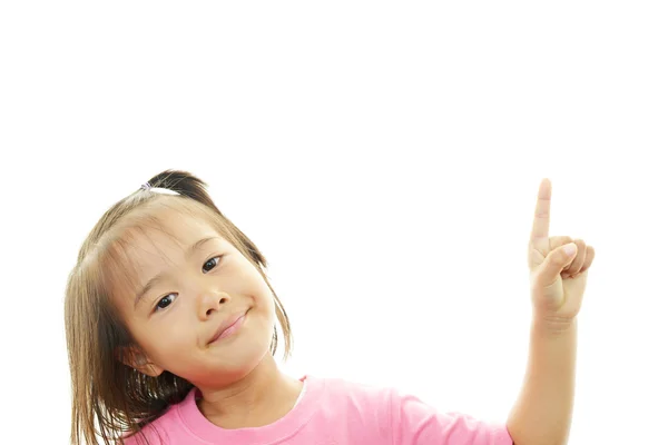 Petite fille asiatique pointant . — Photo