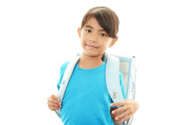 Asyalı kız gülümseyerek