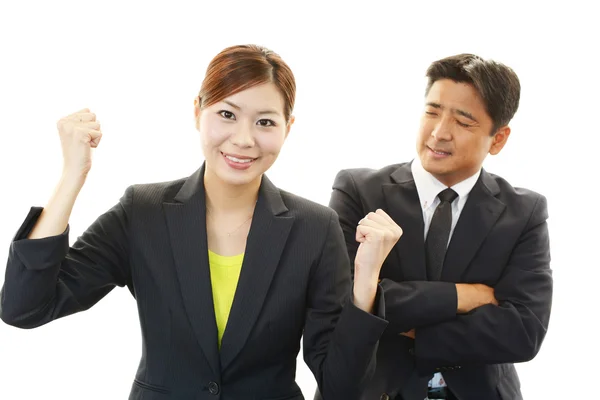 Smiling businessman and businesswoman — Stock Photo, Image