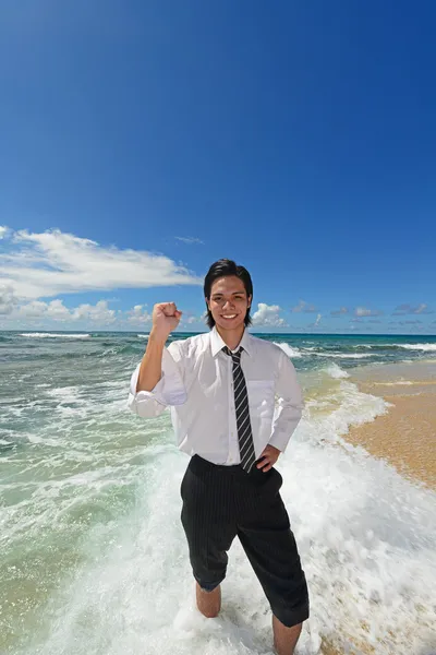 Young man on the beach enjoy sunlight — Stock Photo, Image